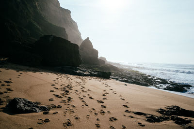 Scenic view of beach against sky