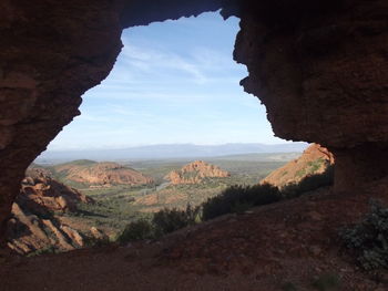 Scenic view of rock formations against sky