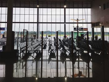 View of airport seen through glass window