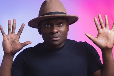 Portrait of man wearing hat