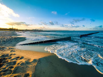 Scenic view of beach against sky