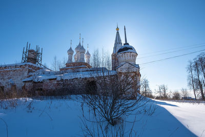 Cathedral against sky during winter