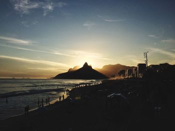 Silhouette of people on beach