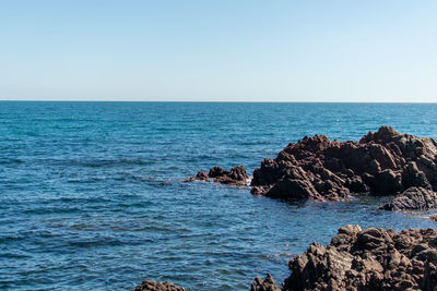 Scenic view of sea against clear sky