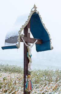 Close-up of clothes hanging against sky