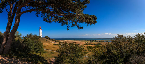 Scenic view of sea against clear blue sky