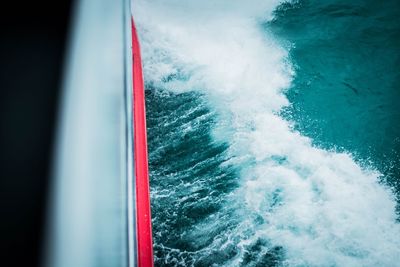 Blurred motion of sea seen through glass