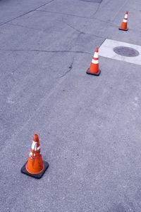 High angle view of traffic cones on road in city