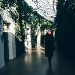 Woman walking on road