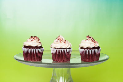 Close-up of cupcakes against white background
