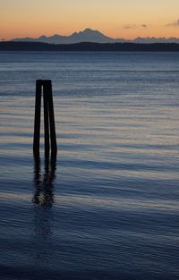 Scenic view of sea against sky at sunset