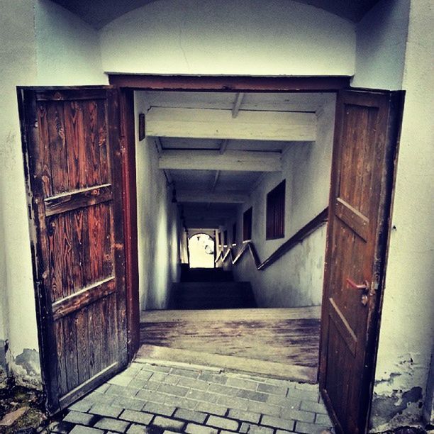 door, architecture, built structure, house, indoors, entrance, building exterior, abandoned, closed, old, wood - material, doorway, building, obsolete, wall - building feature, day, the way forward, damaged, no people, open