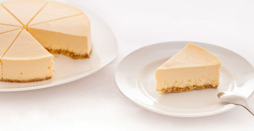 Close-up of cheesecake on table