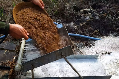 High angle view of man preparing food