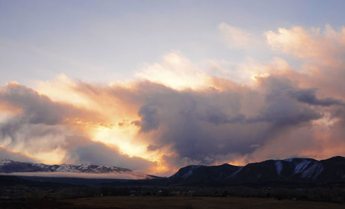 Scenic view of landscape against sky during sunset