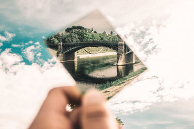 Bridge over river against sky