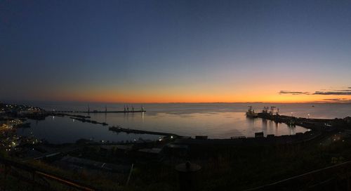 Scenic view of sea against clear sky during sunset