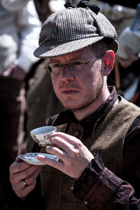 Portrait of man holding ice cream