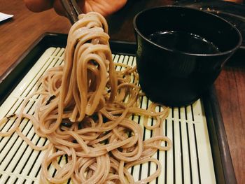 High angle view of person preparing food on table