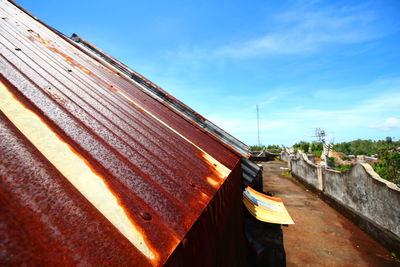 Low angle view of built structure against blue sky