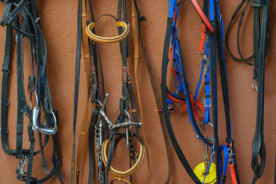 Close up of saddles and bridles