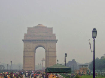 Tourists against sky