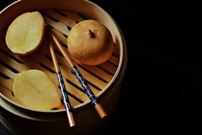 Close-up of bread in plate on table