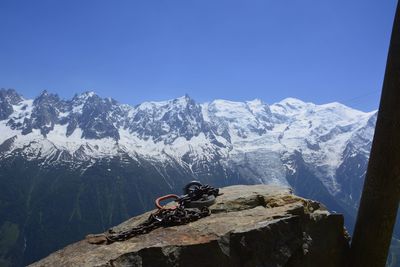 Scenic view of snow mountains against clear sky