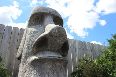 Low angle view of statue against sky