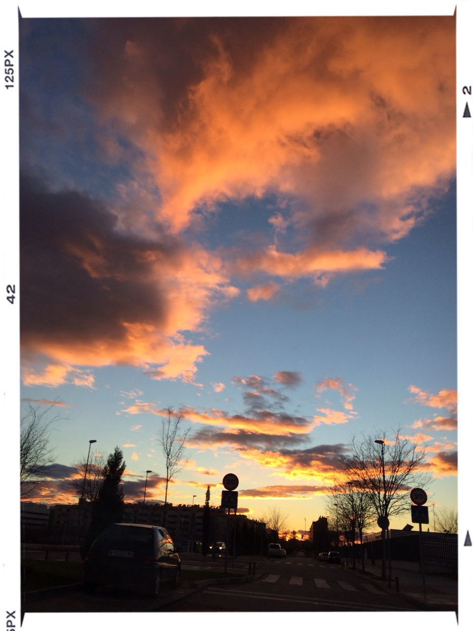 transfer print, sunset, sky, building exterior, auto post production filter, architecture, built structure, cloud - sky, silhouette, city, dusk, orange color, cloud, street light, outdoors, tree, car, street, nature, cloudy