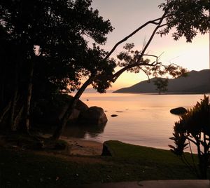 Scenic view of sea against sky at sunset