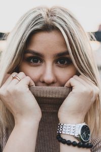 Portrait of beautiful woman in city