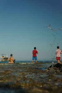 Woman standing in water