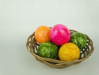 Close-up of multi colored candies in basket