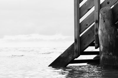 Pier over sea against sky