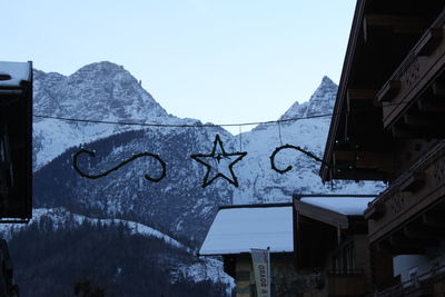 Snow covered mountain against clear sky