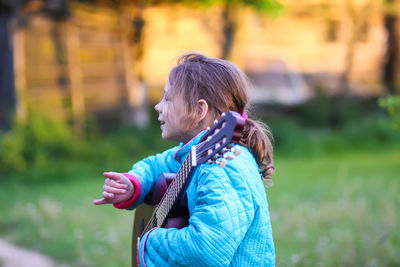 Side view of a girl with blue eyes