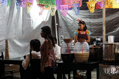 People standing in traditional clothing