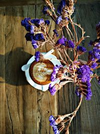 Close-up of purple flowers on table