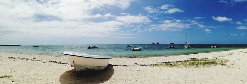 Scenic view of beach against sky