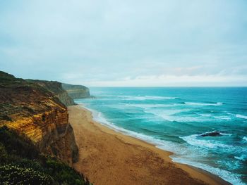 Scenic view of beach against sky