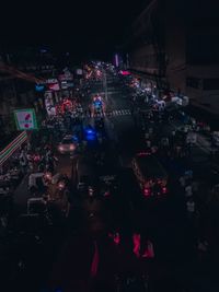 High angle view of people on road at night