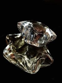 Close up of ring over black background