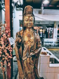 Close-up of statue against building