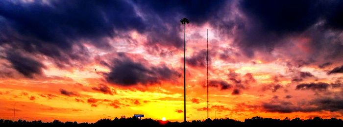 Low angle view of dramatic sky during sunset