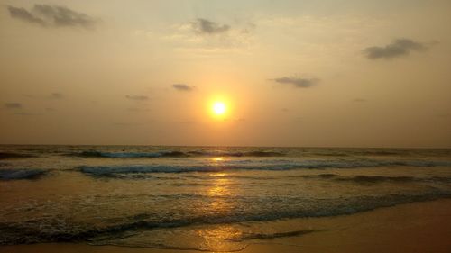 Scenic view of sea at sunset