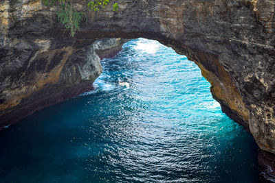 High angle view of rock formation in sea