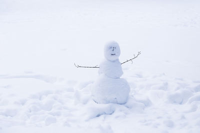 Snowman on field during inter