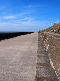 View of road against blue sky