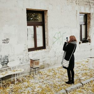 Man standing in front of building